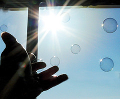 Hand in the air with air bubbles